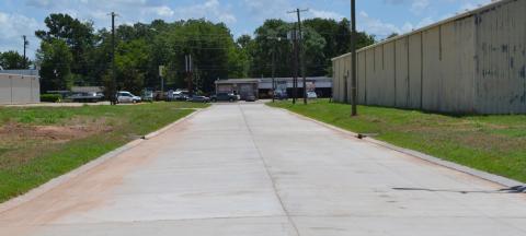 This photograph shows the renovated Pitts Street, which connects Broadway Avenue (shown in the distance) with Applewhite Street.